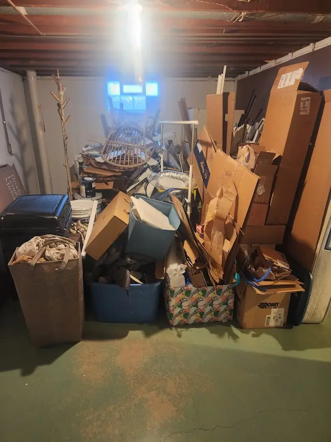 Roll-off dumpster container at job site for Concrete Dumpster Rental in Holly Springs